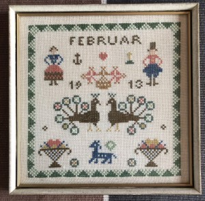 Februar indrammet broderi